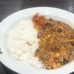 ▲石本的おすすめカレーはポークソースのチキンにこみカレーに、きのこトッピング（ごはん150g）