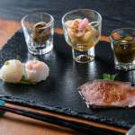 ▲先付。左上から時計回りに、バイ貝、南蛮漬け、もずく酢、若狭牛のローストビーフ、手鞠寿司